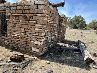 Schoolhouse with fallen roof timbers